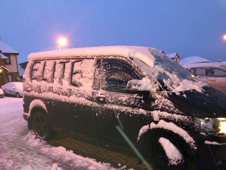 snowy black van